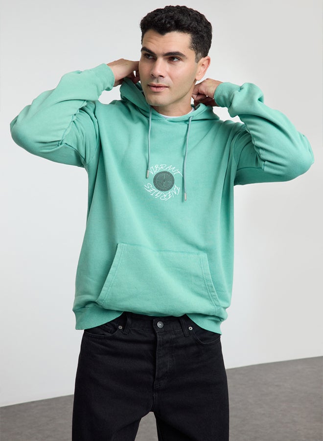 trendyol Mint Oversize/Wide Cut Text Back Printed Hooded Faded Effect Sweatshirt TMNAW25SW00043 - Image 1