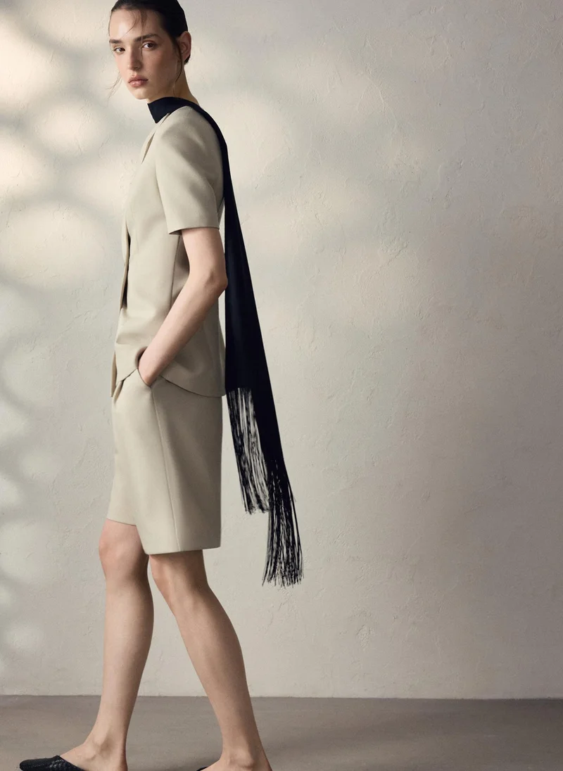 Lichi  Loose-fitting shorts made in suiting fabric with waist pleats for Women | Best Price UAE