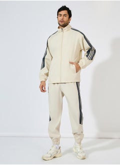 Front Zip Striped Panel detail Athleisure Track Suit - pzsku/Z45544C785F51D4FCD275Z/45/_/1732388102/9bee882a-4fc9-4ebc-ad33-21137759c8bb