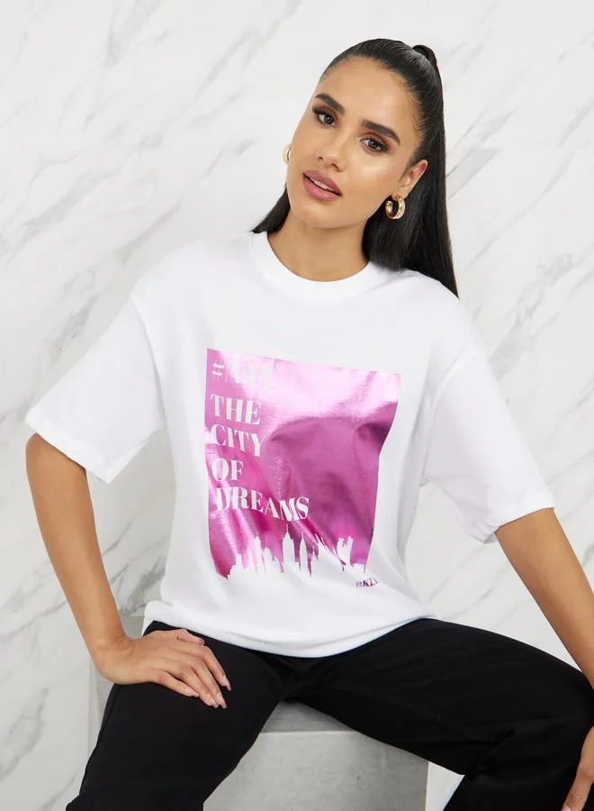 ستايلي Oversized Graphic Foil Print Longline T-shirt