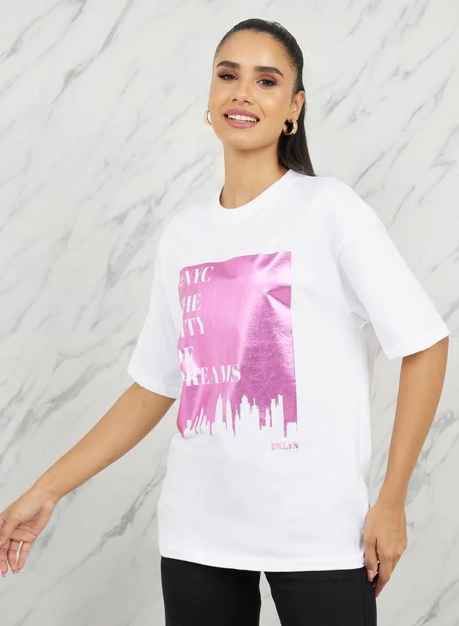 ستايلي Oversized Graphic Foil Print Longline T-shirt