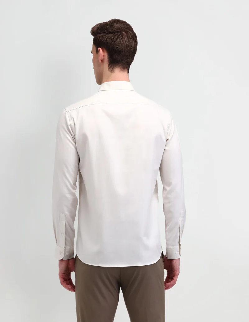 Arrow Beige Solid Manhattan Slim Fit Shirt for Men | Best Price UAE