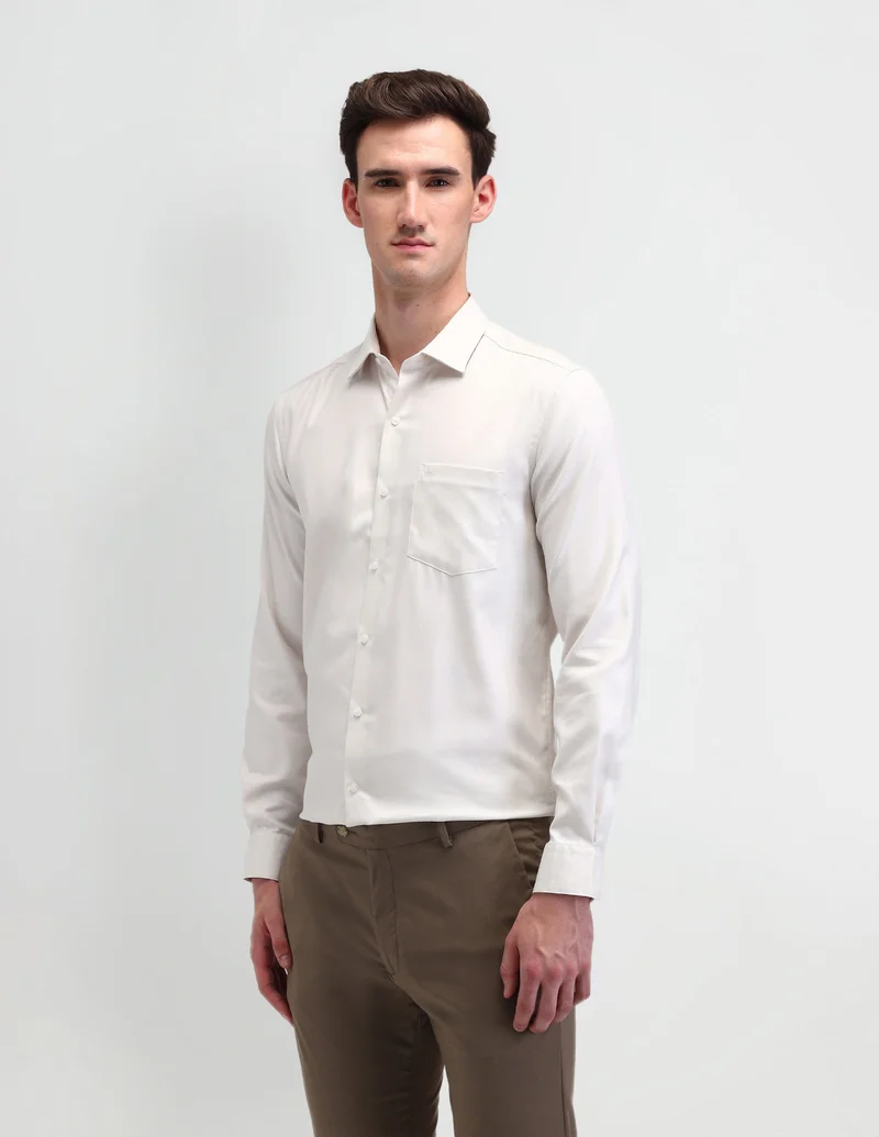Arrow Beige Solid Manhattan Slim Fit Shirt for Men | Best Price UAE