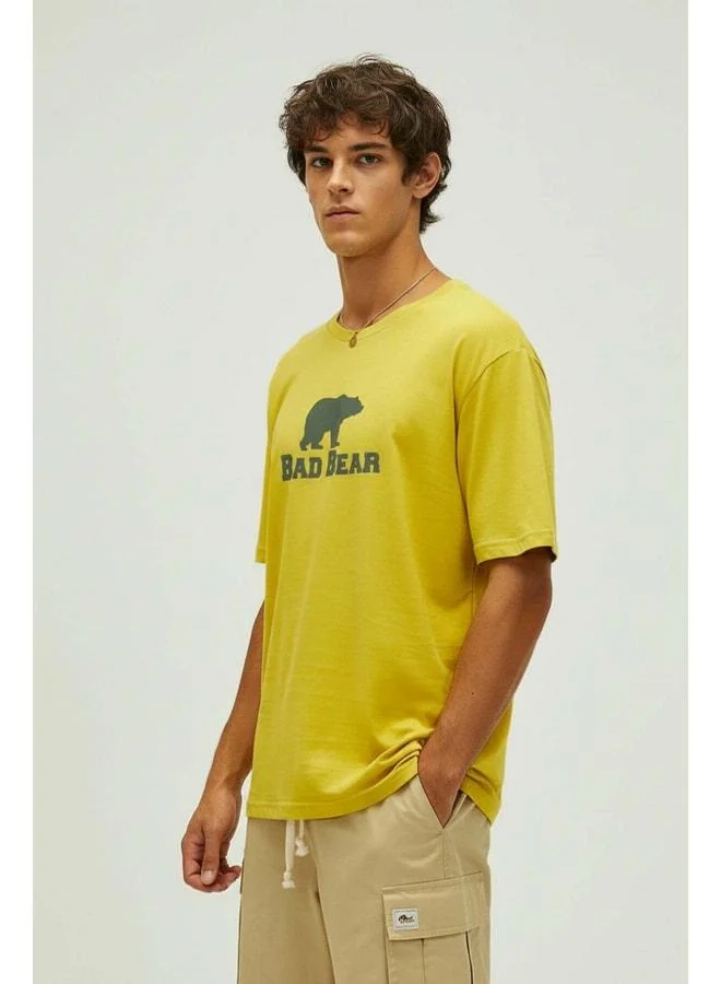 باد بير تي شيرت رجالي مطبوع أصفر من Muscle.