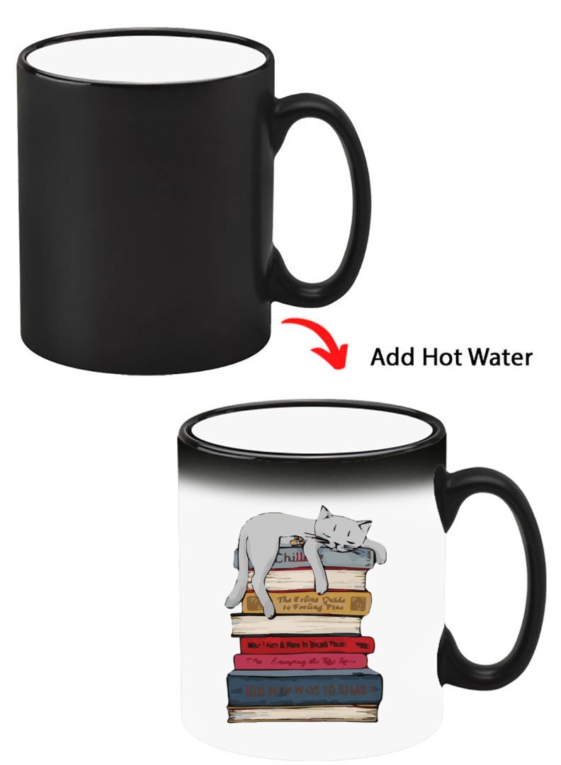 Theodor Color Changing Heat Sensitive Ceramic Mug, Image Revealed When HOT Liquid is Added! Cat on books - Image 1