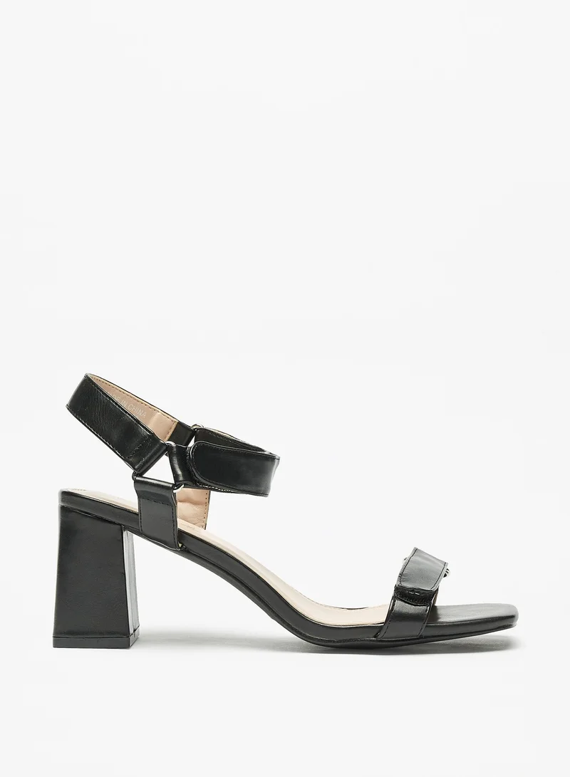 فلورا بيلا من شو إكسبرس Womens Block Heel Sandals with Hook and Loop Closure