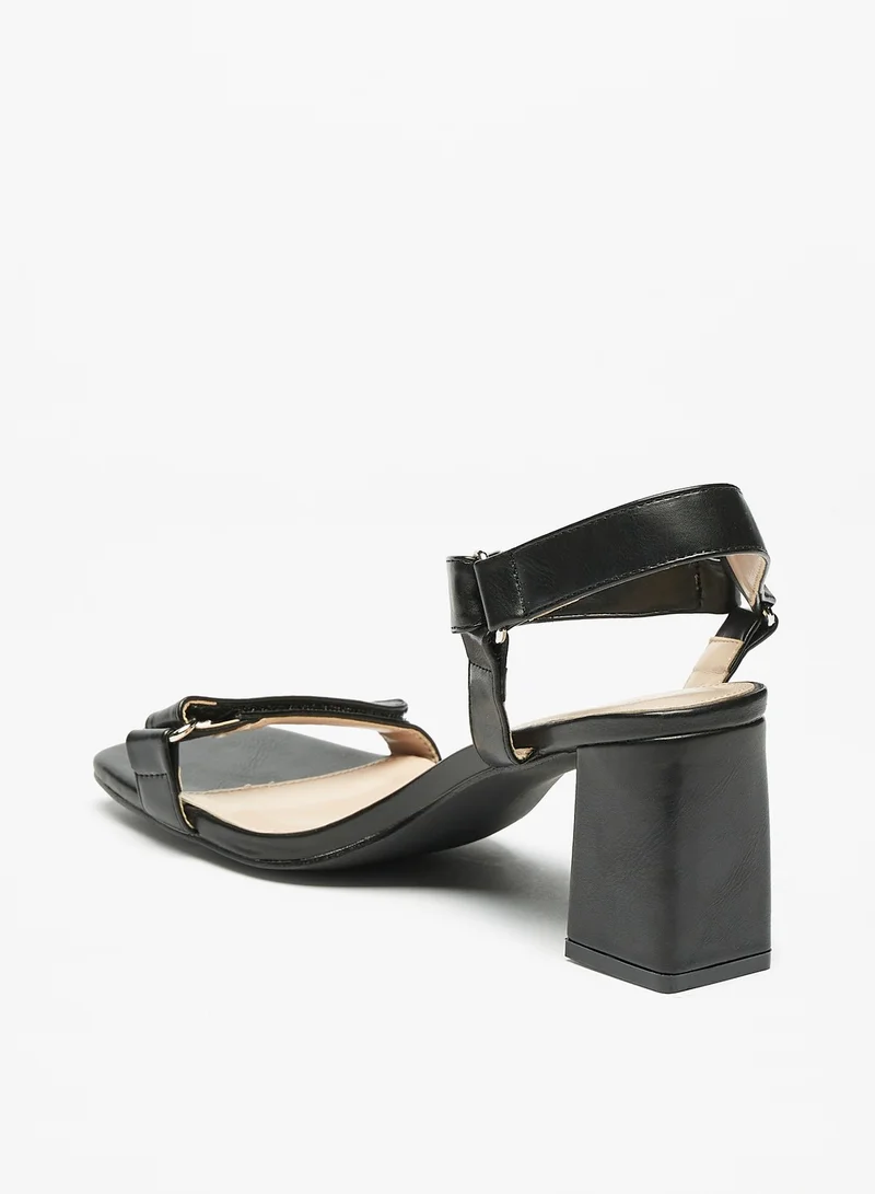 فلورا بيلا من شو إكسبرس Womens Block Heel Sandals with Hook and Loop Closure