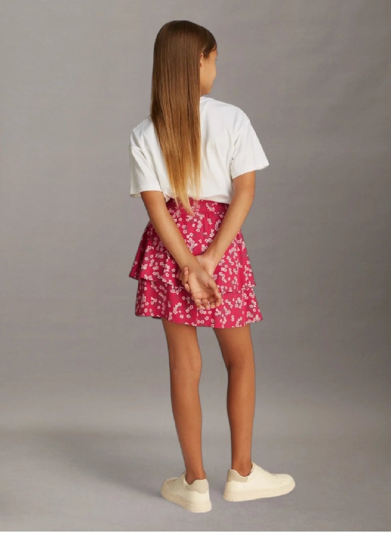 كالفن كلاين جينز تنورة فلير بطبعة زهور - Image 2