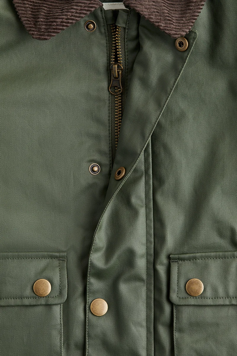 اتش اند ام جاكيت من التويل المشمع