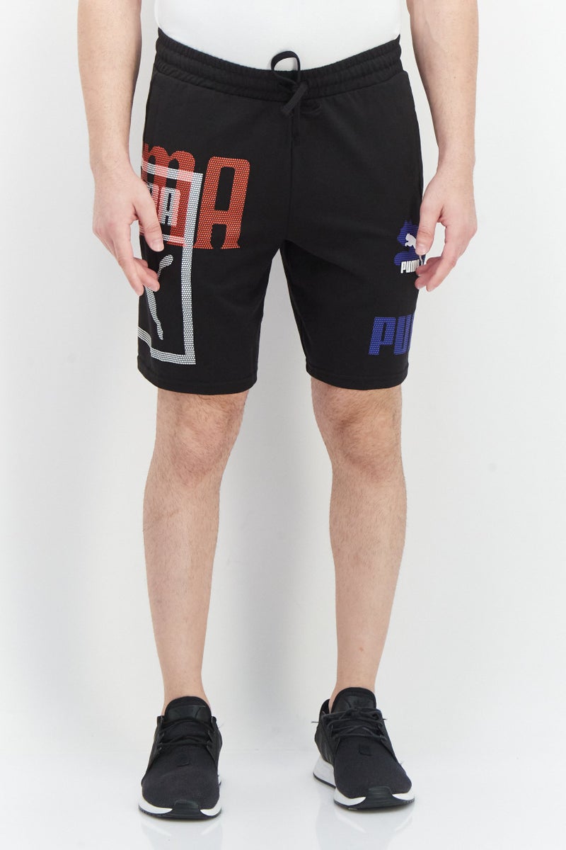 PUMA Men Sportswear Fit Graphic Print Training Shorts, Black - Image 1