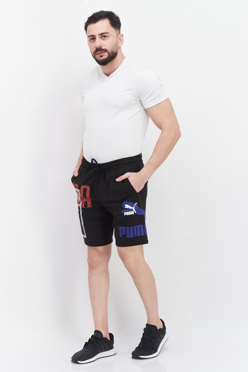 PUMA Men Sportswear Fit Graphic Print Training Shorts, Black - Image 2