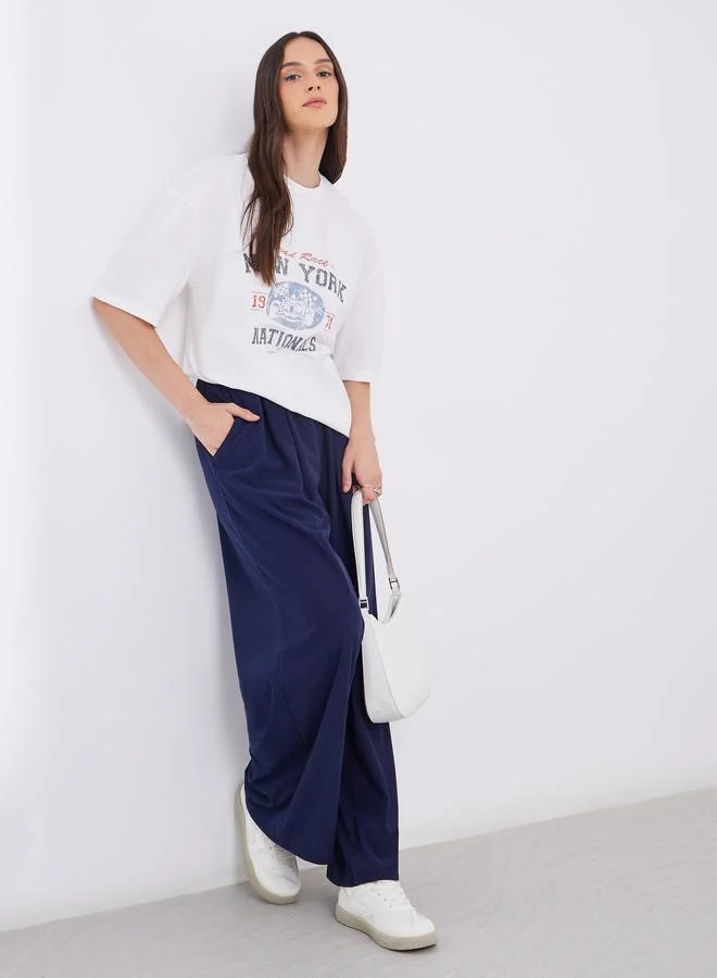 ستايلي Styli Women Off White Graphic Print Short Sleeve Oversized T-Shirt