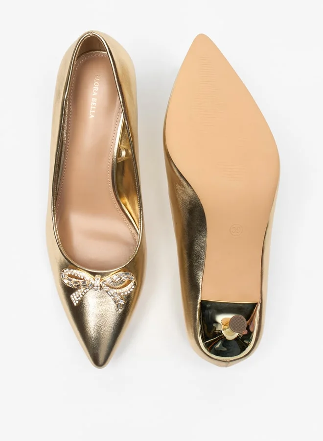 فلورا بيلا من شو إكسبرس Women's Studded Bow Accent Pointed Toe Pumps with Stiletto Heels Ramadan Collection