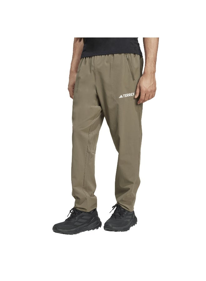 Adidas Mt Ess Pants M Green Hiking Pants For Men - Image 1