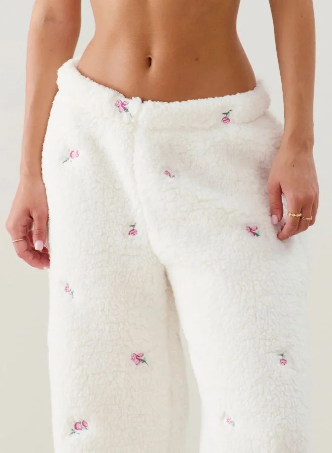 UNDIZ Fleece trousers with embroidered floral patterns