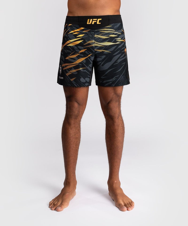 Venum Men's Standard Authentic UFC Fusion Night Fight Short Fit, Black/Gold - Image 1