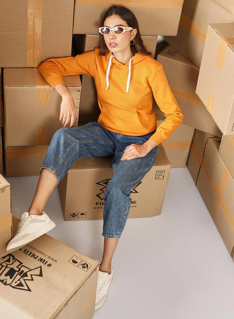 Campus Sutra Women's Mustard Yellow Solid Pullover Hoodie