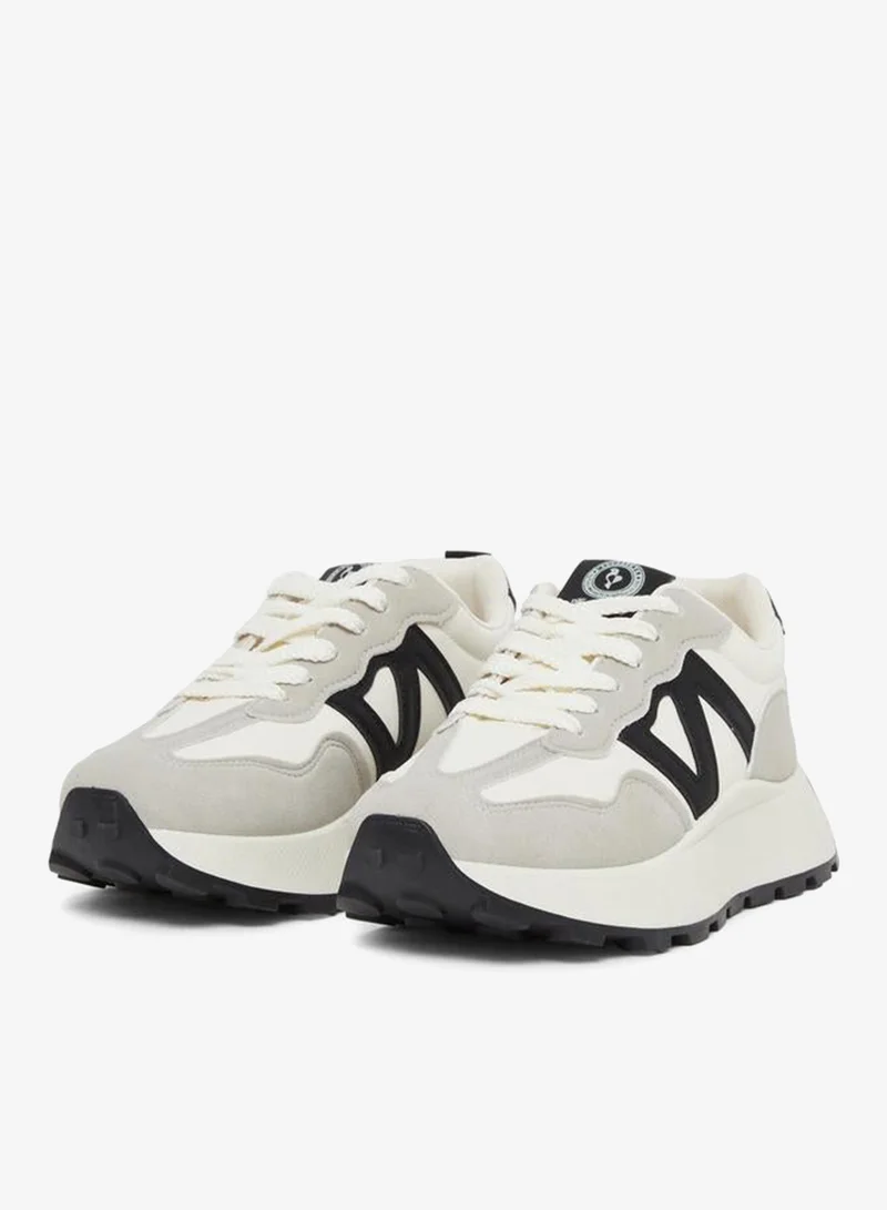 ستايلي سنيكرز لاصق بأربطة ولون كتلة