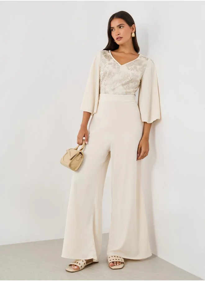 ستايلي Styli Embellished Balloon Sleeve V-Neck Jumpsuit