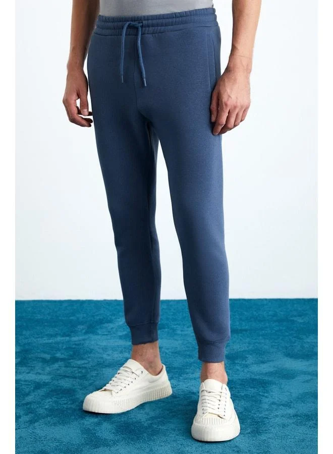 GRIMELANGE HAKONE Men's Basic Soft Regular Fit Elastic Cuffed Organic Cotton Indigo Jogger Pants.