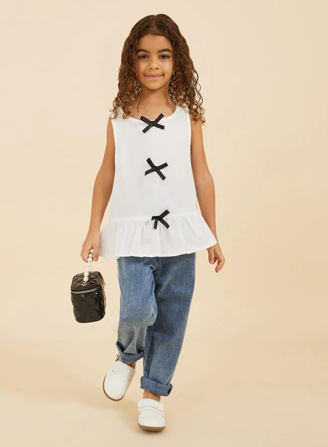 Styli Styli Round Neck Ruffled Hem Blouse with Bow Detail