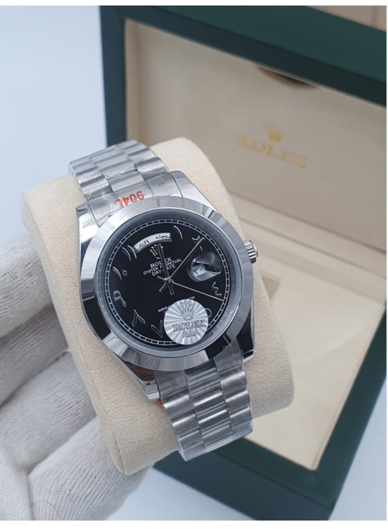 Rolex men's stainless steel battery-operated wristwatch with accessories