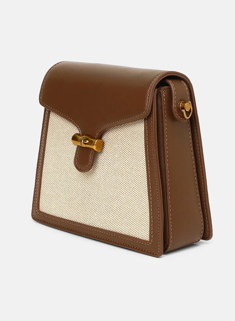 Haute Sauce Colour block Interlock Regular Vegan Leather Sling Bag with Detachable Strap For Women