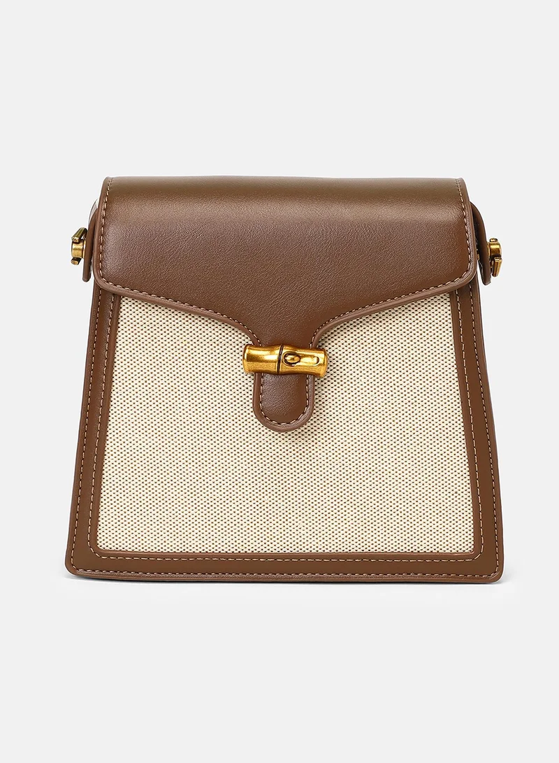 Haute Sauce Colour block Interlock Regular Vegan Leather Sling Bag with Detachable Strap For Women