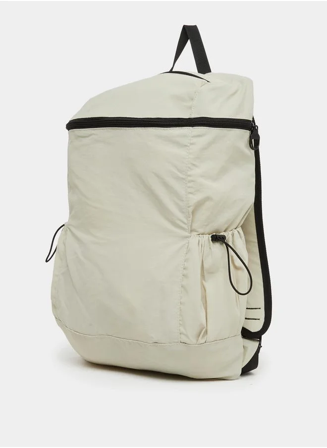ستايلي Styli Solid Backpack with Zip Closure and Drawstring Detail
