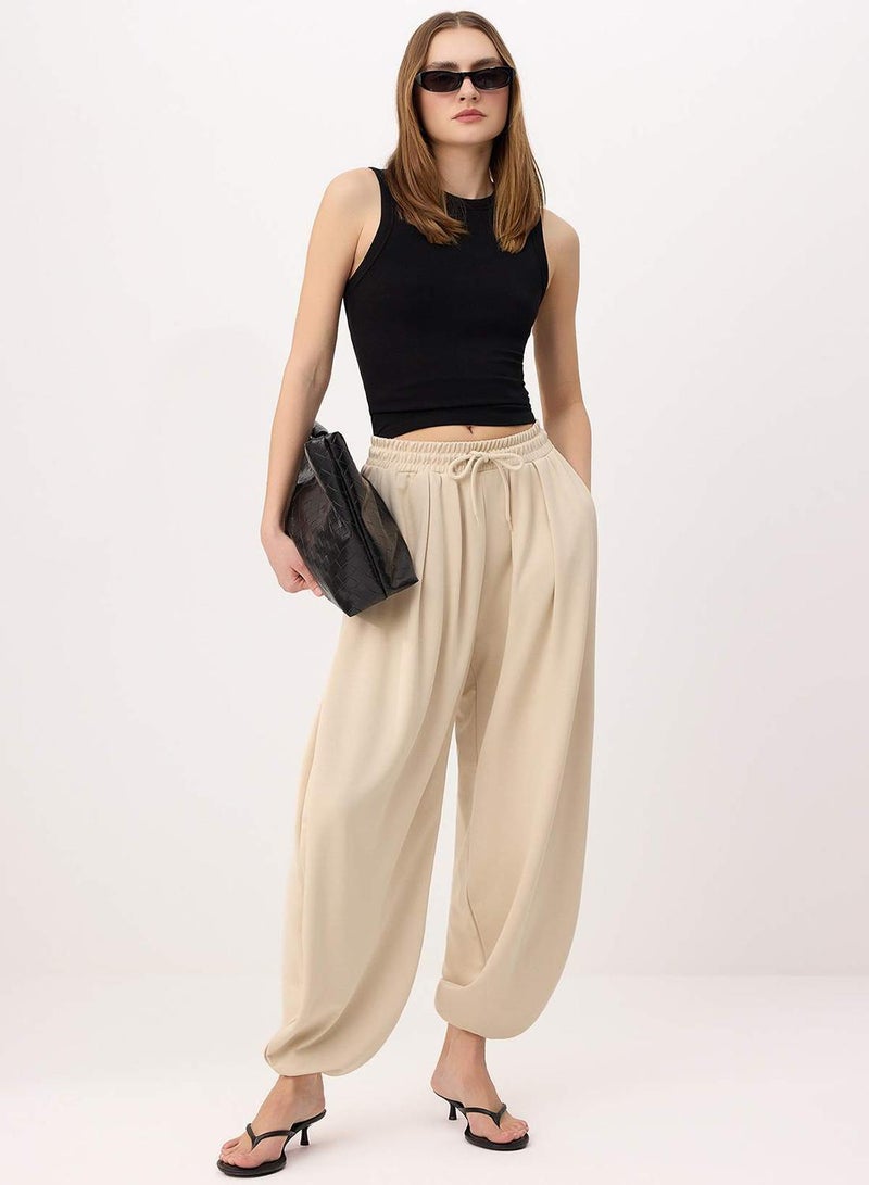 trendyol Taş Soft Touch Carrot/Shalwar Fit Flexible Knitted Sweatpants - Image 1