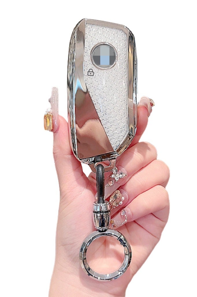 OUYoo غطاء مفتاح BMW من OUYoo، واقي مفاتيح TPU ناعم مع سلسلة مفاتيح لامعة لموديلات BMW 2023 2024 من الفئات 7 (740 – 760i) وi5 وi7 وiX وX1 وX5 وX6 وX7 وXM (أبيض كريستالي). - Image 1