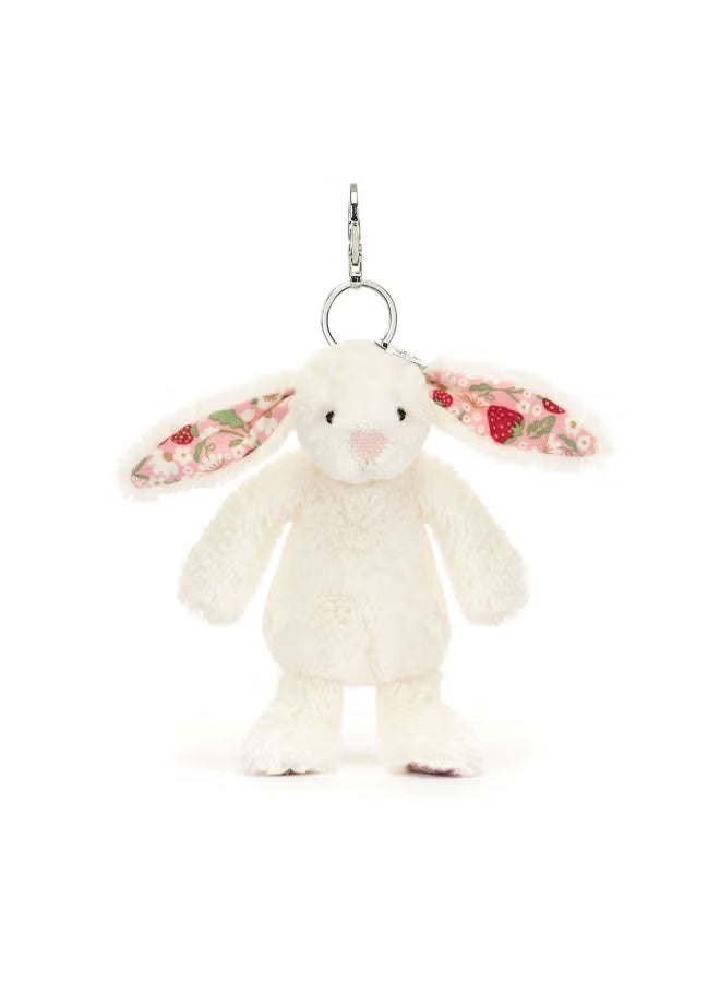 Jellycat Blossom Cream Bunny Berry Bag Charm 13cm, Soft Plush Bunny Keyring with Strawberry Floral Ears - Image 1