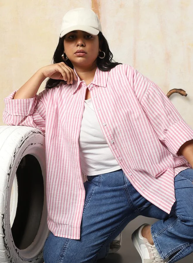 Women Shirts in Pink featuring Oversized fit with a strip pattern, spread collar collar, collar neckline, full sleeve, secured with button closure, crafted from 100% cotton – an essential addition to your stylish collection.