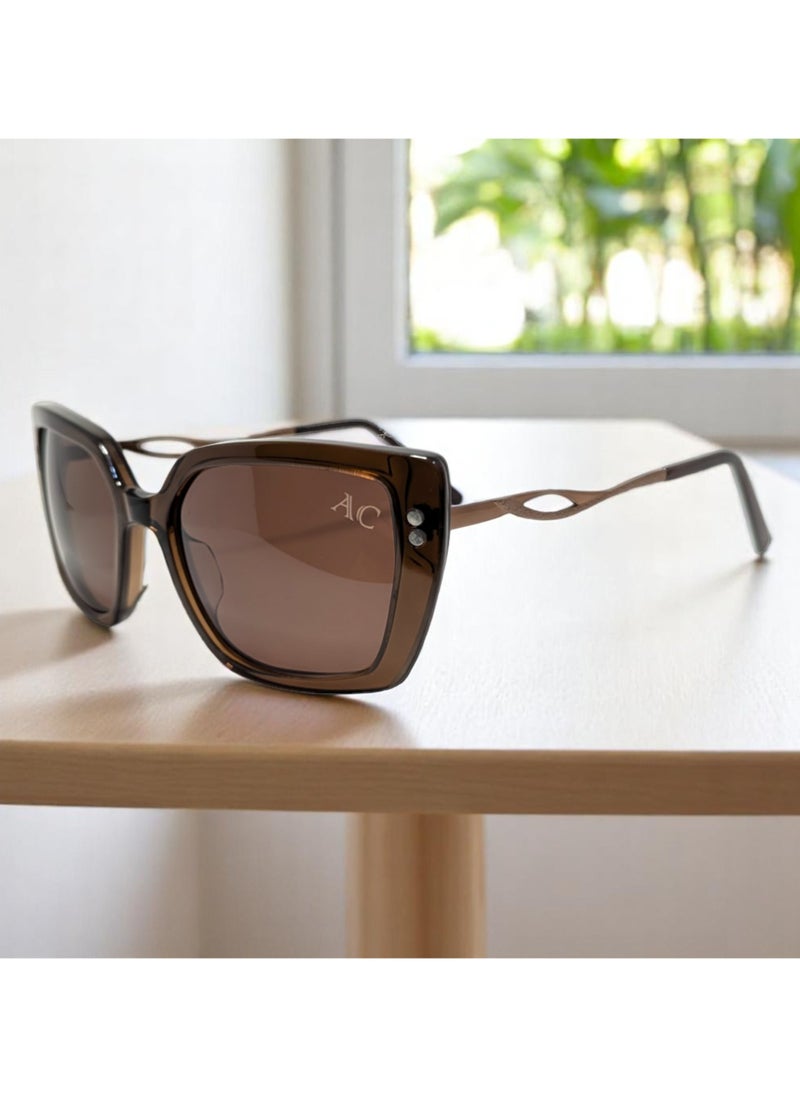 Armando Cavelli - Authentic Armando Cavelli sunglasses, crafted from carefully selected premium acetate for a luxurious look and longevity with extensive use. This model combines modernity and classic style, with a raw brown acetate front and brown -plated metal temples to complete your luxury look. Comes with premium polymer lenses offer UV400 protection in a brown. - Image 1
