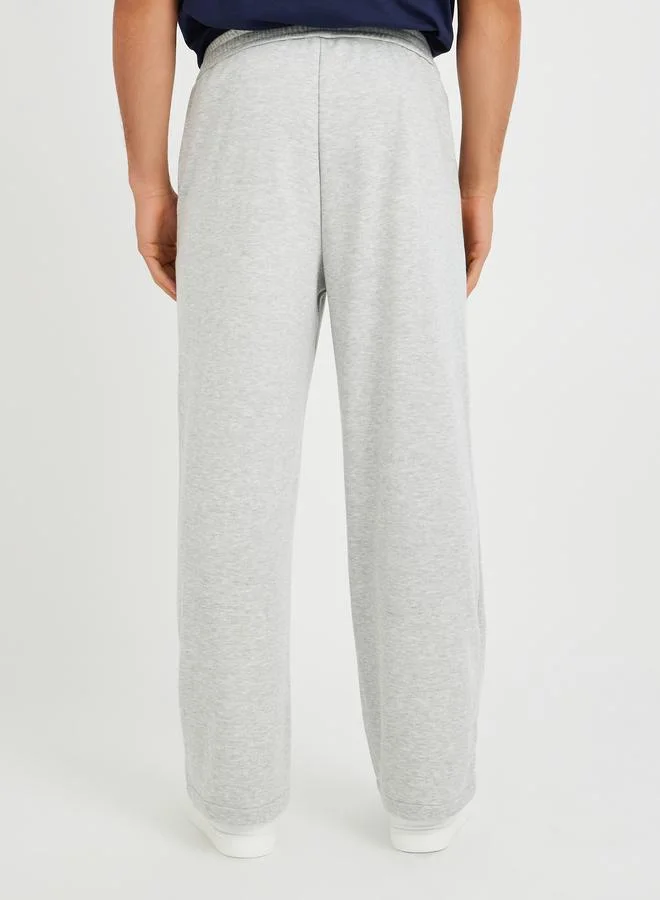 ستايلي Styli Men Grey Solid Oversized Open Hem Joggers with Drawstring Waist
