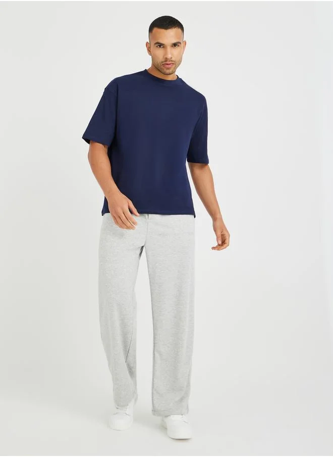 ستايلي Styli Men Grey Solid Oversized Open Hem Joggers with Drawstring Waist