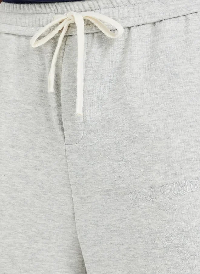 ستايلي Styli Men Grey Solid Oversized Open Hem Joggers with Drawstring Waist