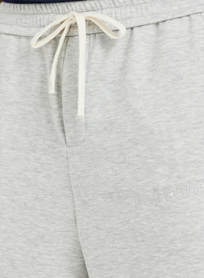 ستايلي بنطلون رياضي رجالي رمادي سادة بقصة واسعة وخصر برباط - Image 3