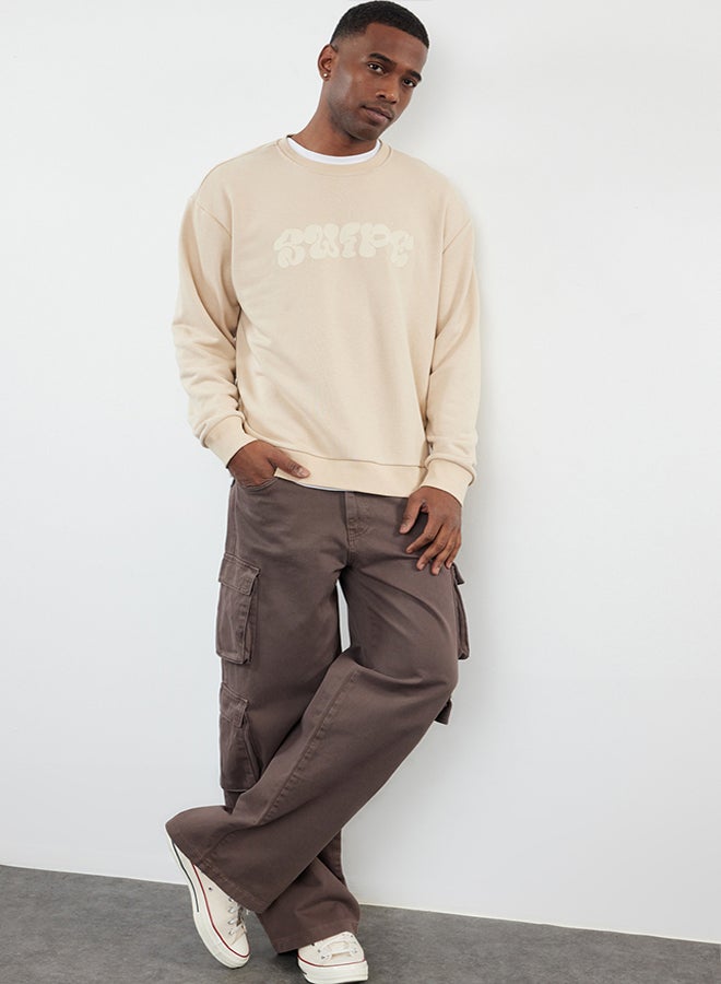 trendyol Beige Oversize/Wide Cut Embossed Printed Sweatshirt TMNAW25SW00046 - Image 2