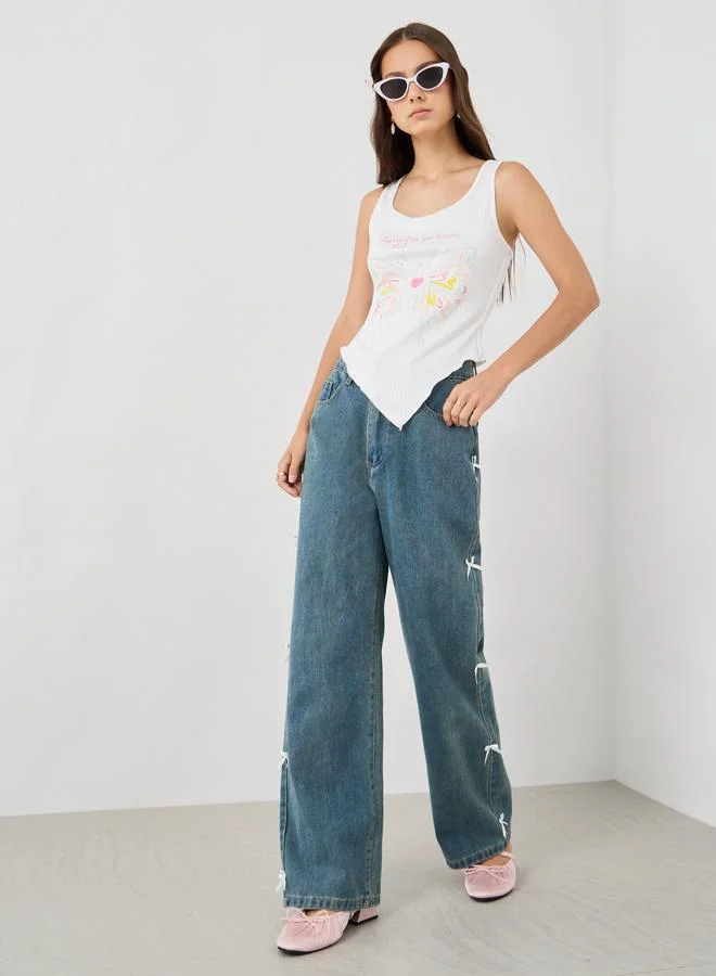 تايك تو توب بدون أكمام بياقة مستديرة وطبعة جرافيك