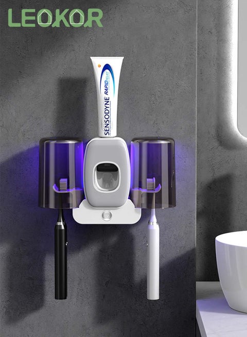 2 Cups Toothbrush Holder with Toothpaste Dispenser Wall Mounted UV Toothbrush Sanitizer USB Rechargeable Toothbrush Organizer