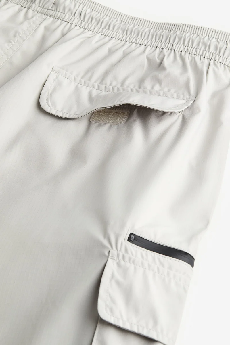 اتش اند ام شورت سباحة كارغو بطول الركبة