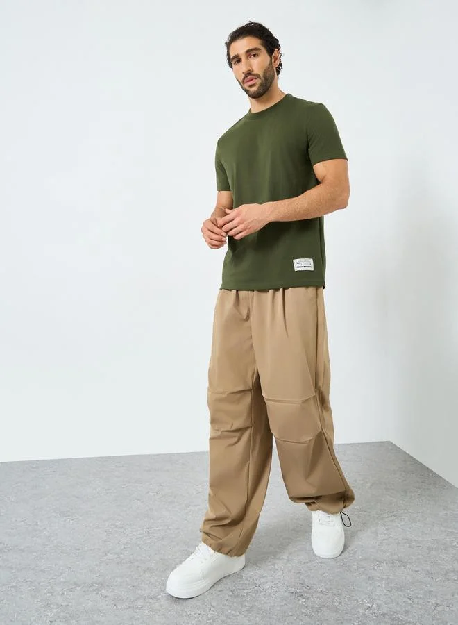 ستايلي Styli Badge Detail Mock Neck Regular Fit T-Shirt