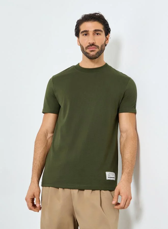 ستايلي Styli Badge Detail Mock Neck Regular Fit T-Shirt