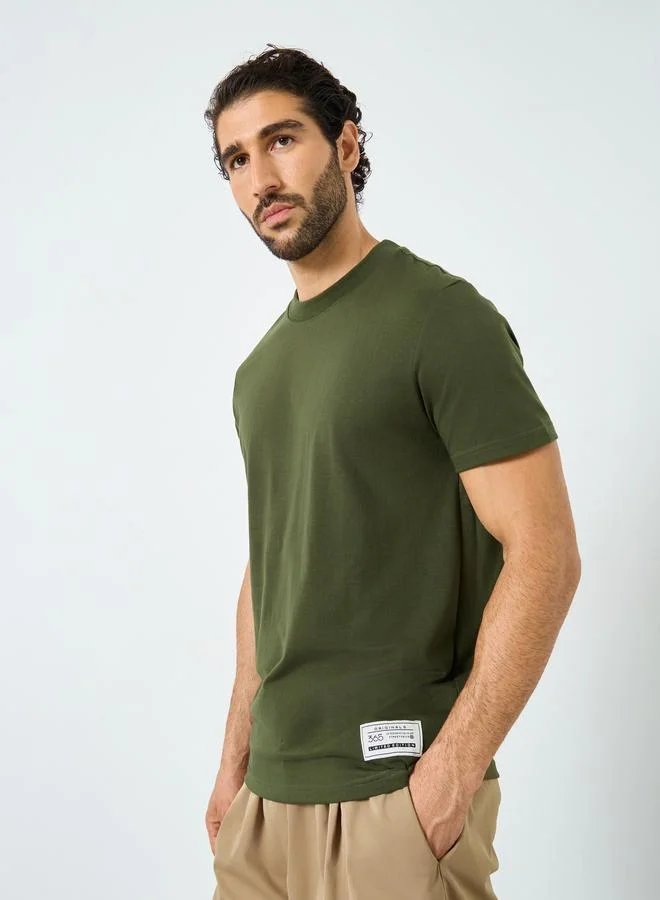 Styli Styli Badge Detail Mock Neck Regular Fit T-Shirt