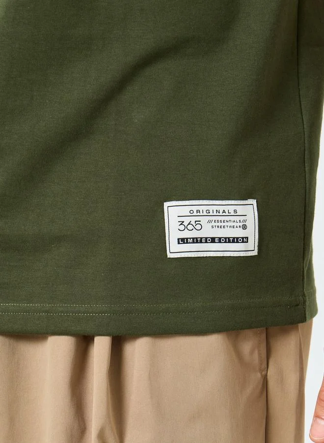 Styli Styli Badge Detail Mock Neck Regular Fit T-Shirt