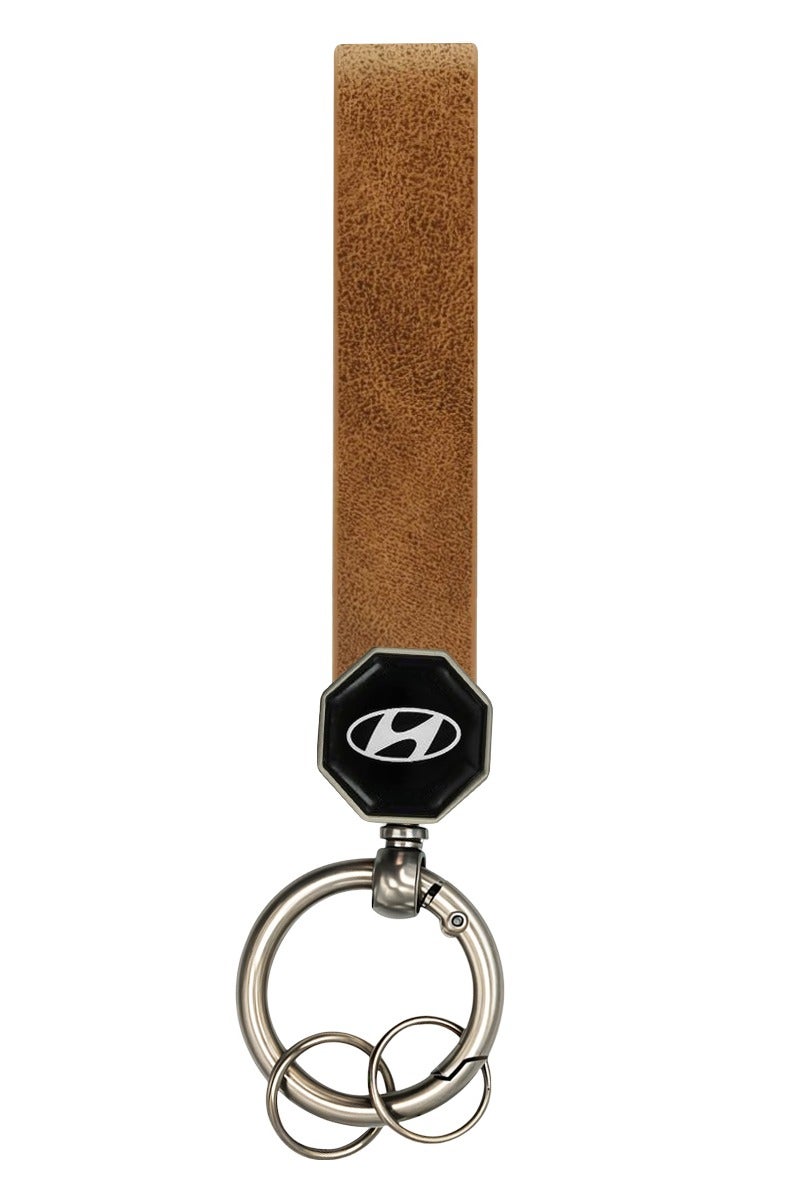 HYUNDAI Hyundai Leather Keychain 12.5cm x 1.5cm with 360° Rotating Metal Ring, Double Screw Fixing, Durable Brown Leather Strap, Portable Spring Ring, Key Holder for Car, House Keys, and Accessories, Stylish Key Organizer with Hyundai Logo  - Image 1