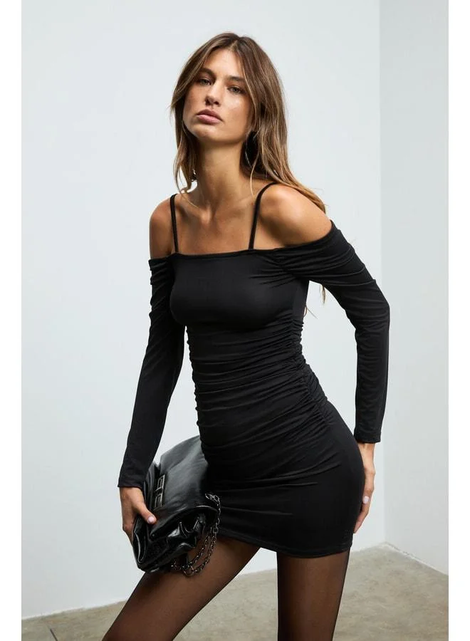 Grimelange GRESSE Women's Open-Shoulder Ruffle-Detail Flexible Fabric Body-Fitting Strappy Mini Black Dress.
