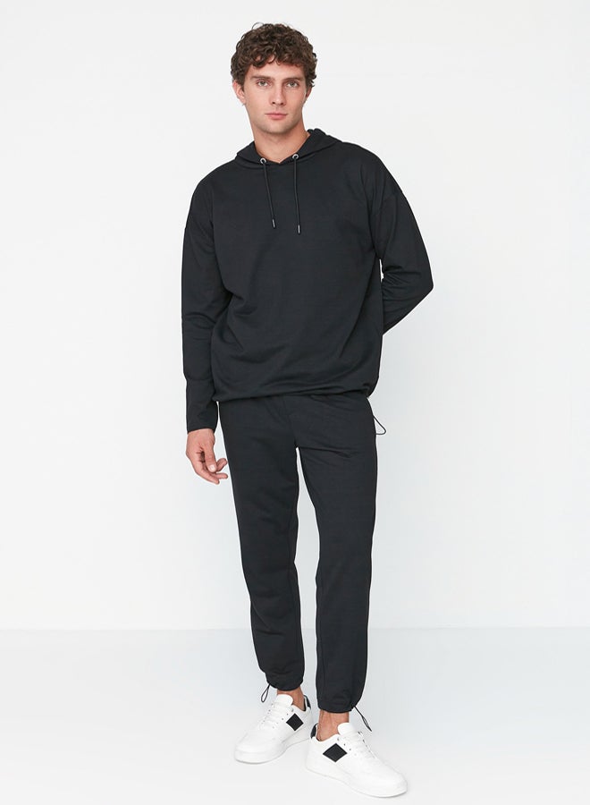 trendyol Black Tracksuit Set Oversize/Wide Cut Hooded Sweatshirt- TMNSS21EM0041 - Image 1