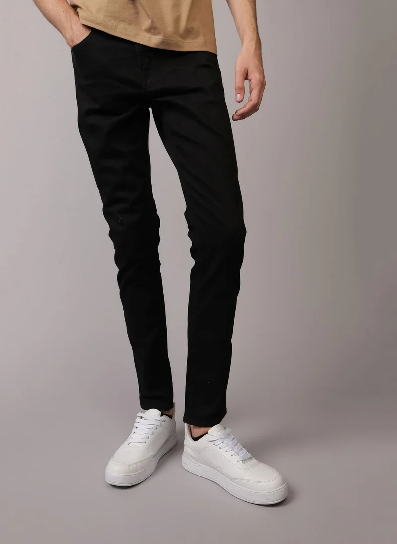 American Eagle Airflex+ Mid Wash Skinny Fit Jeans